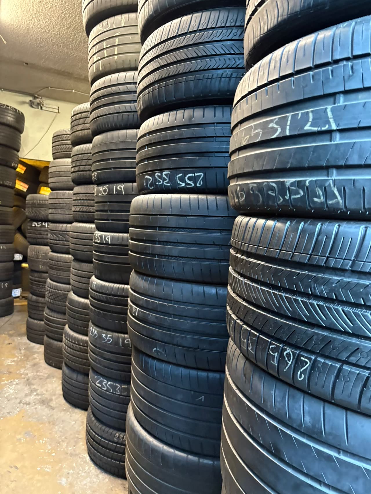 Tire work on the shop floor at Super Discount Tires